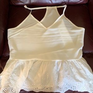 A white tank top blouse